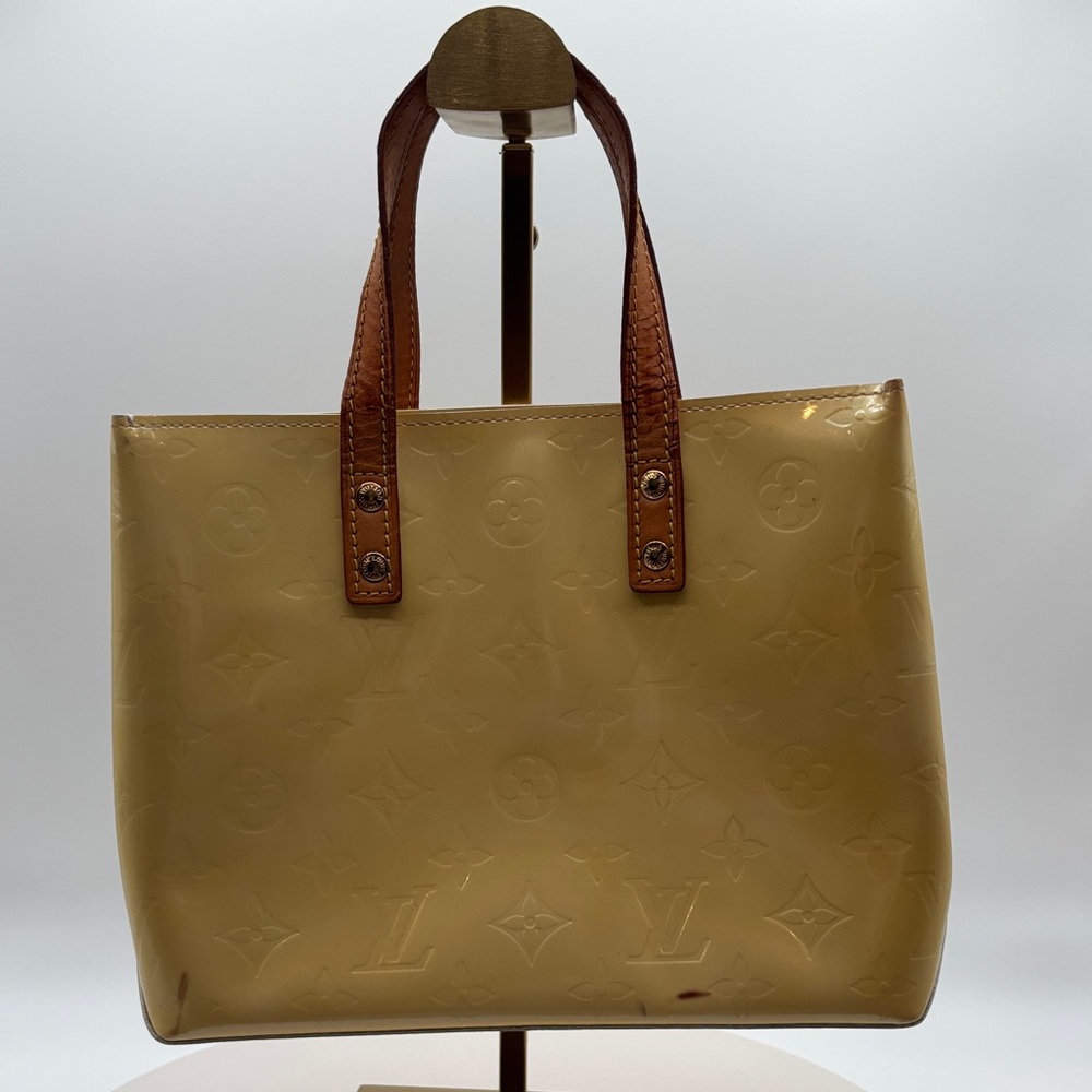 Pre-loved authentic Louis Vuitton Vernis Reade PM yellow tote.